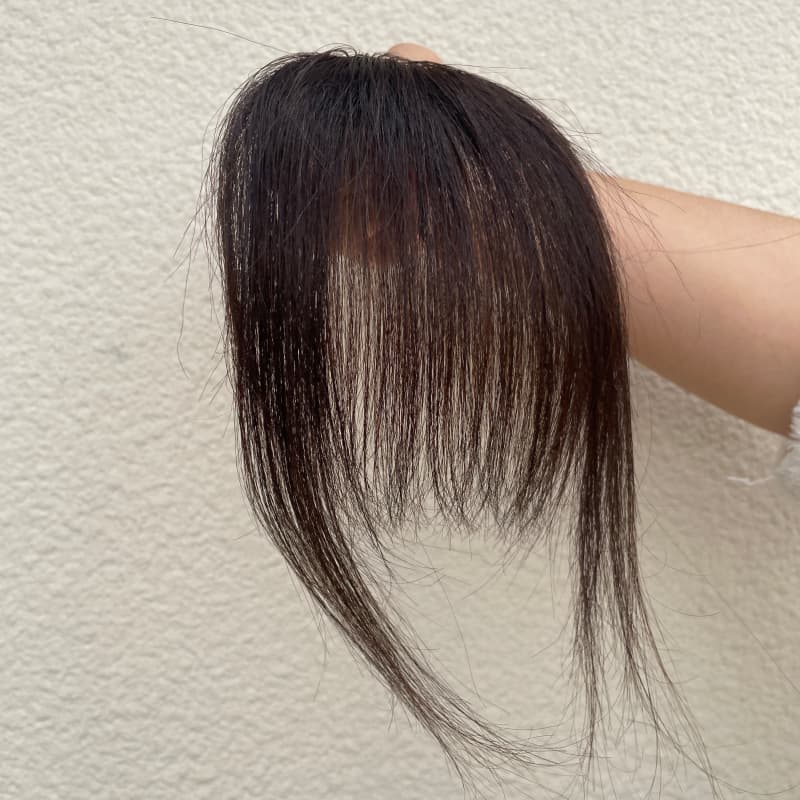 Natural black human hair clip-in bangs with face-framing side strands